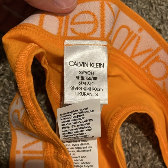 NWOT Calvin Klein Orange Thong Panty size Small - Picture 3 of 4